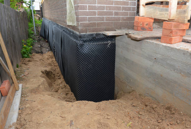 Happy homeowners after waterproofing job in Cheltenham